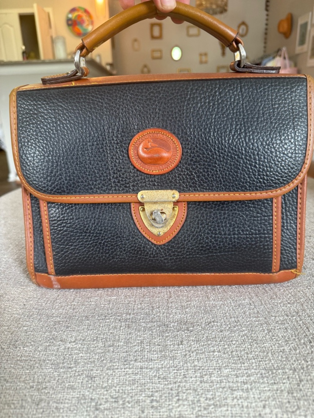 Dooney & Bourke Black and Tan Pebbled Leather Top-Handle Satchel